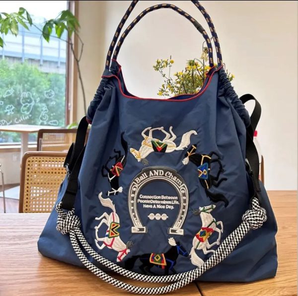 Environmental protection embroidered shopping bag nylon cloth flower portable niche fashion shopping bag can be customized. - Image 3